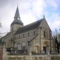 A quel architecte ont été confiés les travaux de l'Eglise de Falvy ?