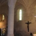 Dans la chapelle nord de l'église de Falvy, quelle sépulture s'y trouve ?